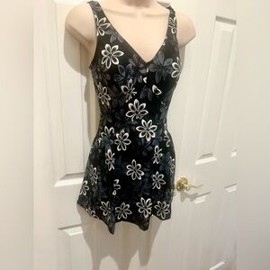 Lovely skirted swimsuit by Le Cove Sz 10